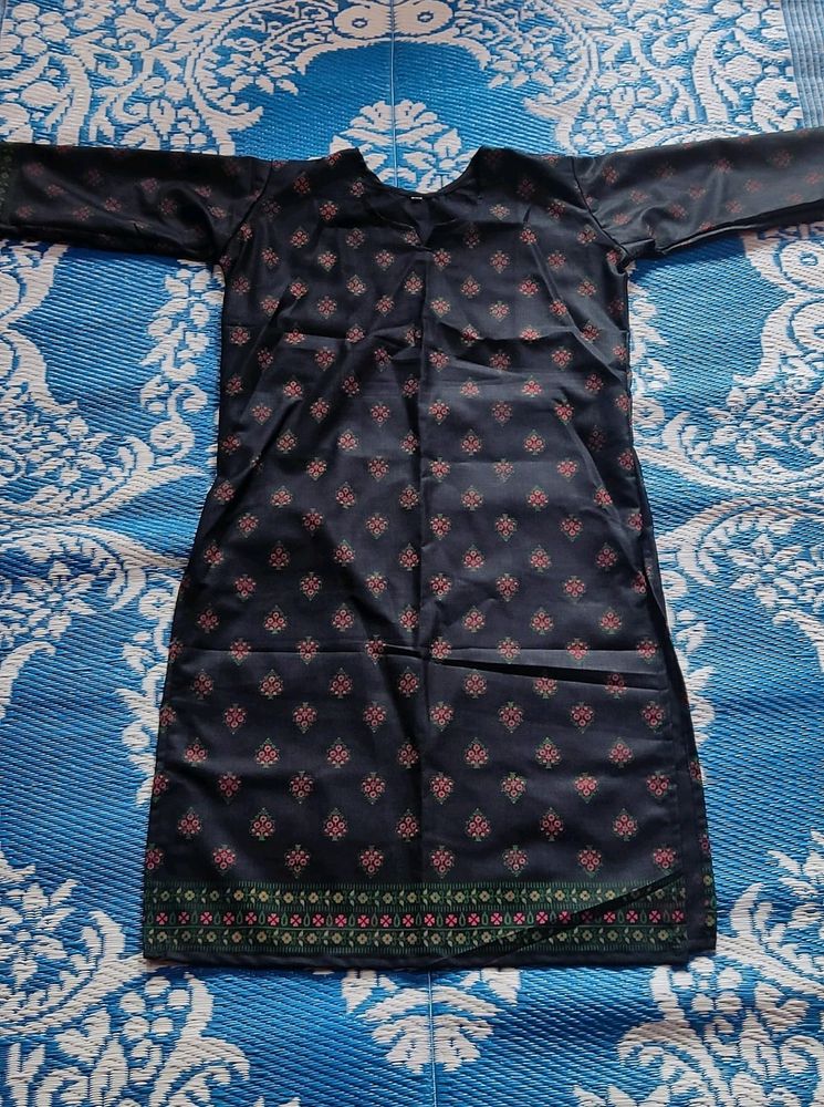 pure cotton black colour long kurta which has red and green printed flowers ..the kurta is unused