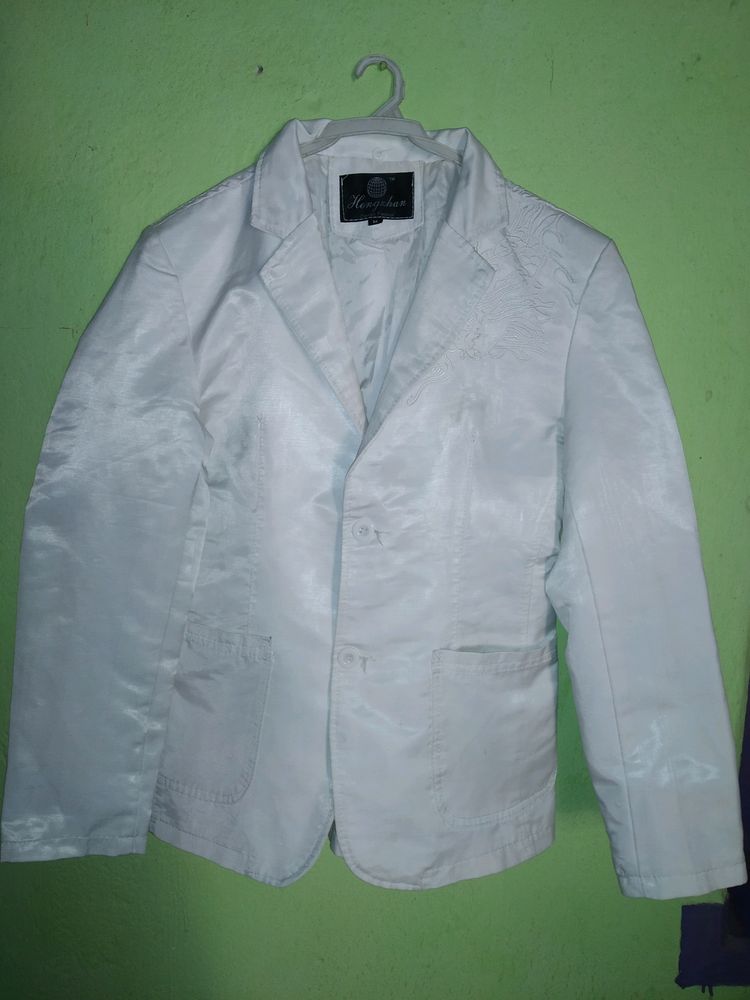 White Bleazer With Hard Sholder And Embroidery. This Is Almost New Item. Used 2 Or 3 Times In Occasion.