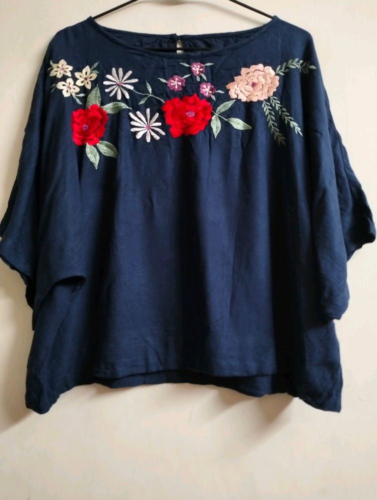 Blue Top With Embroidery On Neck