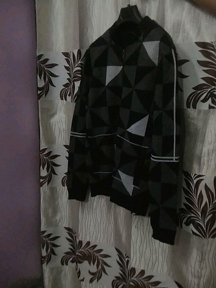 A Black Colour Wollen Jacket Large In Size