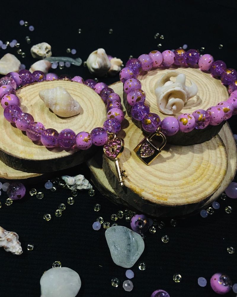 purple marble beads with cute chams.