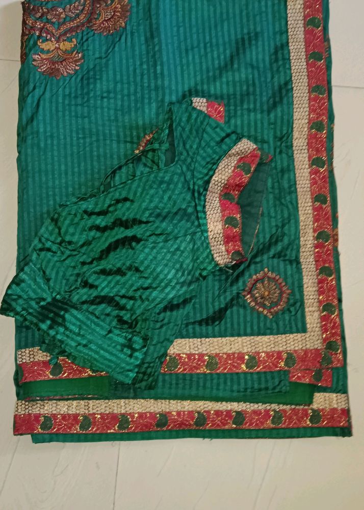 Saree With Back Open Stitched Blouse