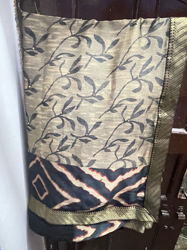 Beige And Black Coloured Saree Without Blouse