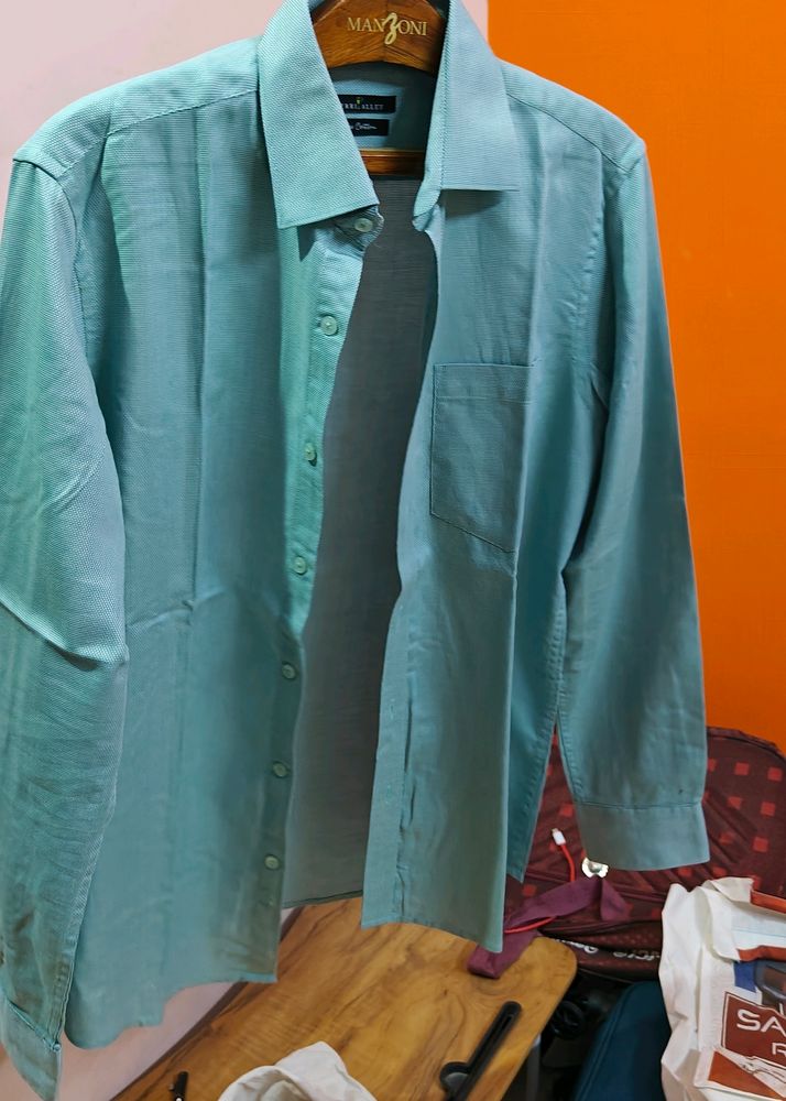 Its A Light Turquoise Colour Shirt From Perri Alley Brand With pakka Condition